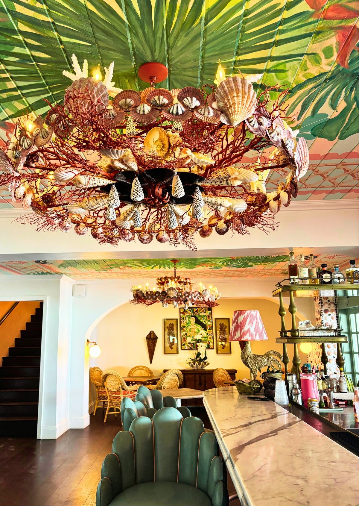 seashell art and chandelier at The Pink Mermaid Coral Sands, Harbour Island Bahamas